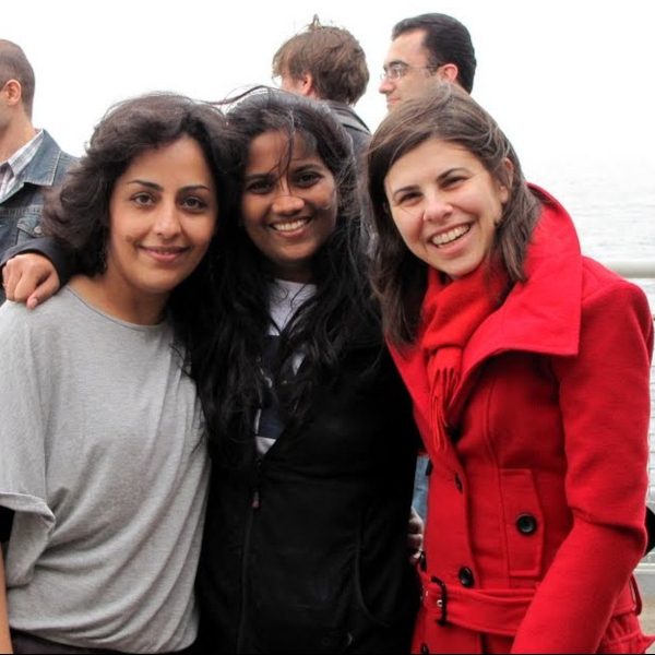 students embracing smiling